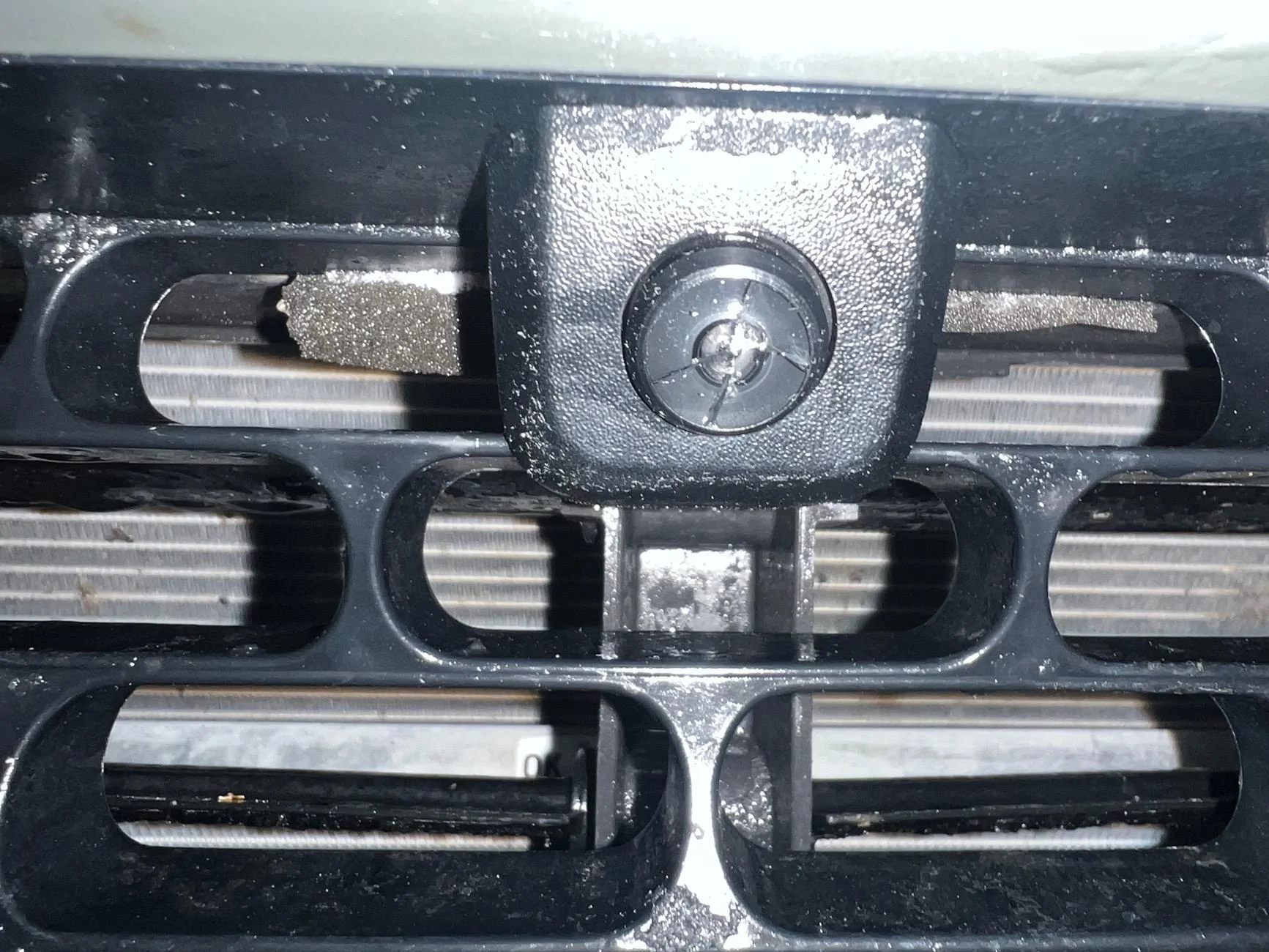 Rivian R1T R1S forget cracked windshields, who has cracked their front bumper camera? IMG_2584