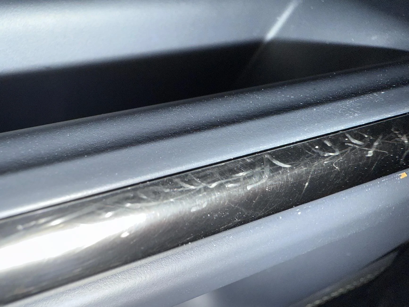 Rivian R1T R1S Interior door chrome scratches easily IMG_1095