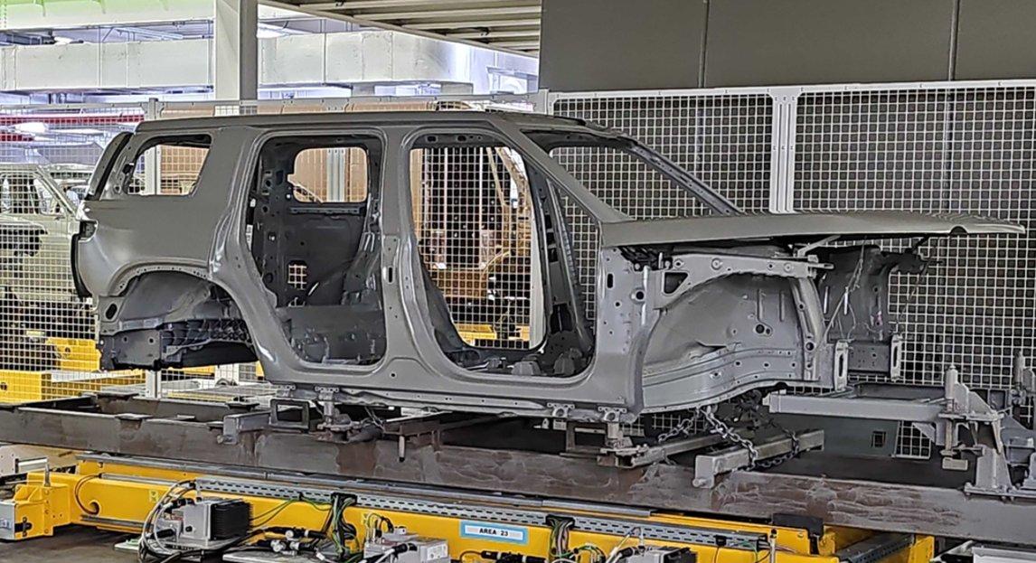 Rivian R1T R1S RJ shows R2 in e-coat! IMG_2506