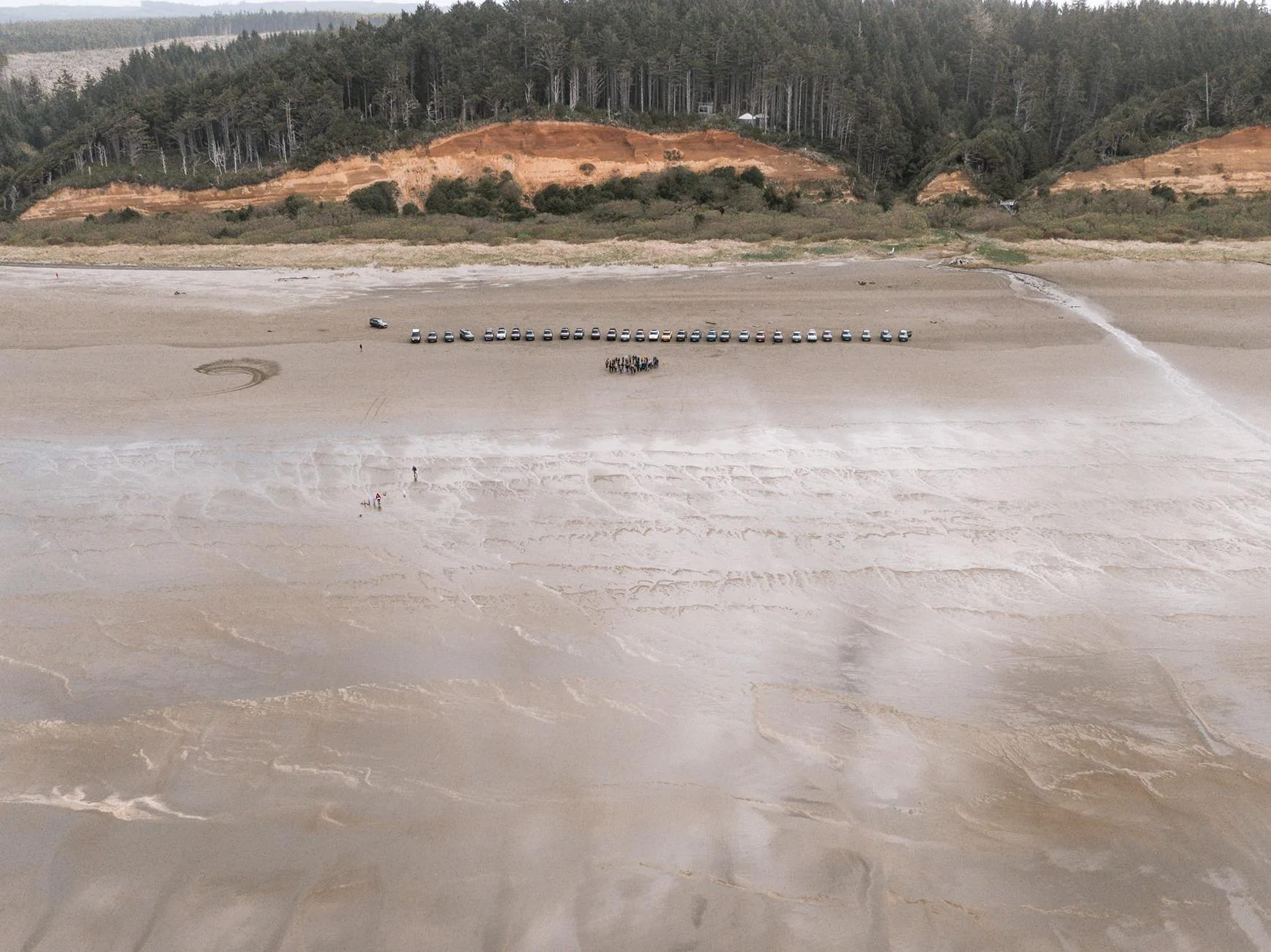 Rivian R1T R1S Happy Earth Day! 31 Rivians. Many friends and family and pets cleaning up two beaches! 5 truck loads! DJI_20250419095140_0098_D