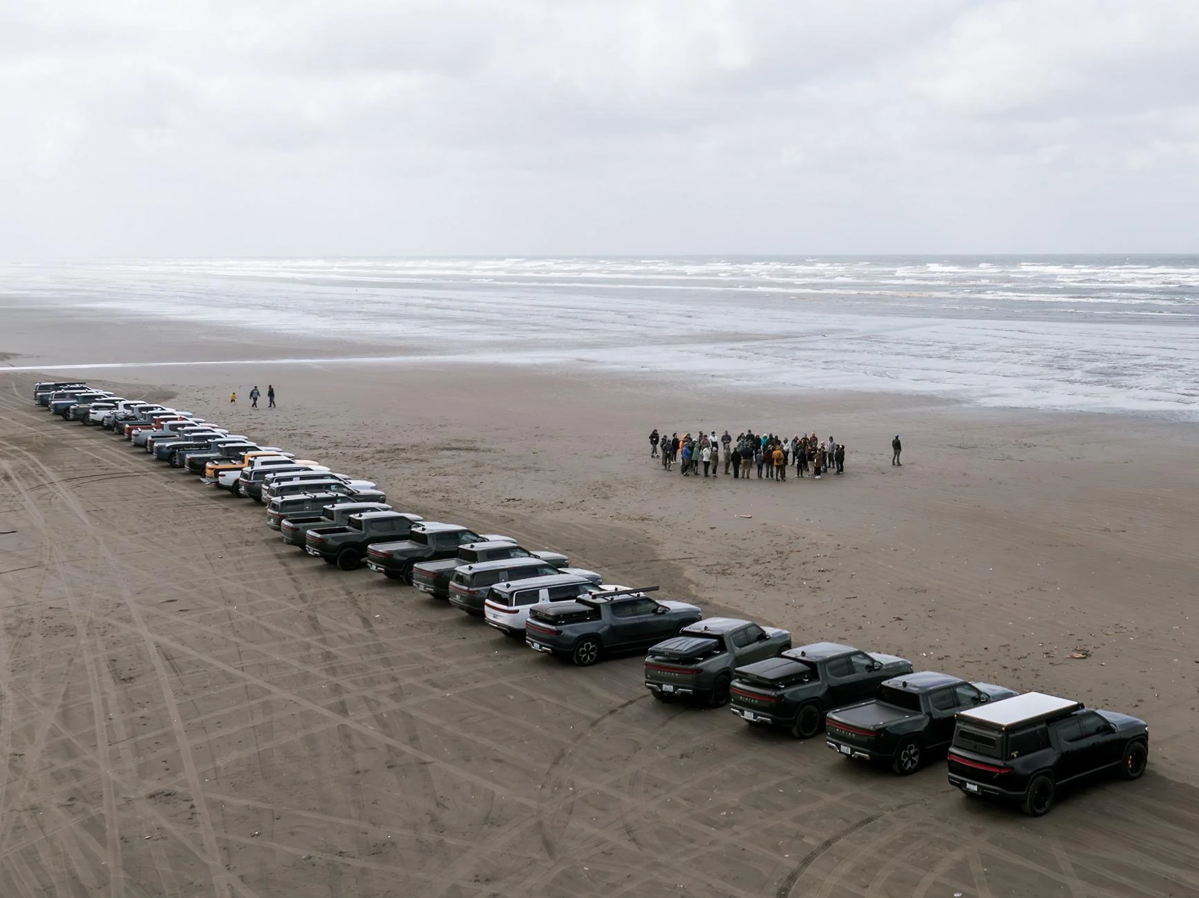 Rivian R1T R1S Happy Earth Day! 31 Rivians. Many friends and family and pets cleaning up two beaches! 5 truck loads! DJI_20250419095030_0096_D-Enhanced-NR