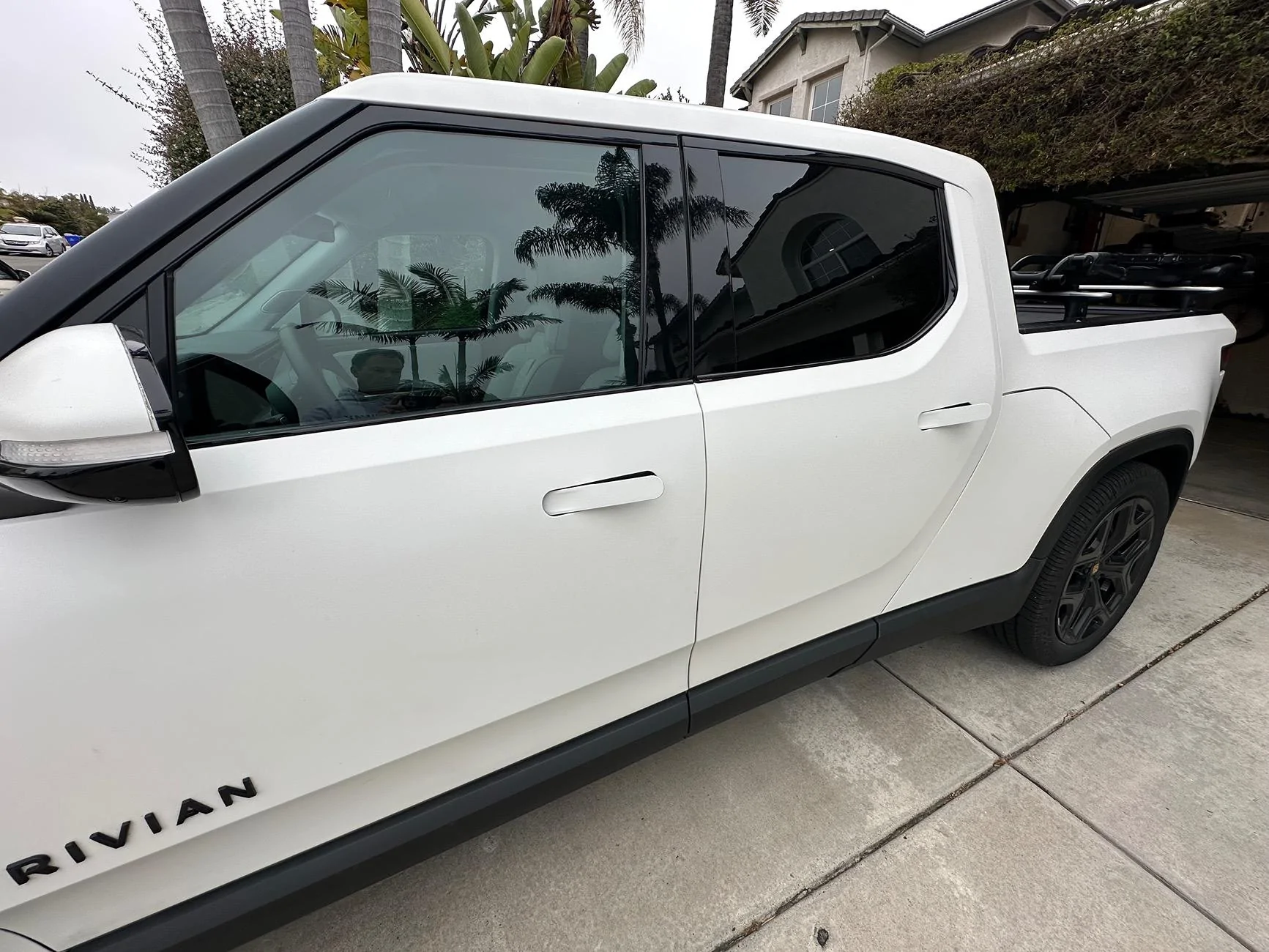 Rear door window lower trim bending up again | Rivian Forum - R1T R1S ...