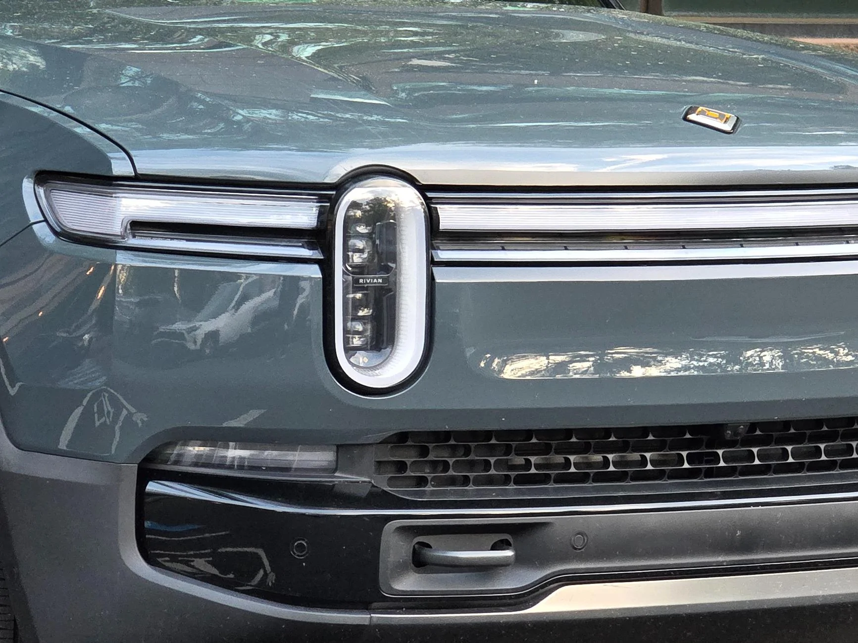 Rivian R1T R1S Front appearance improvement with vinyl on front light bar + side stripes! 54502184251_43aca0d053_o