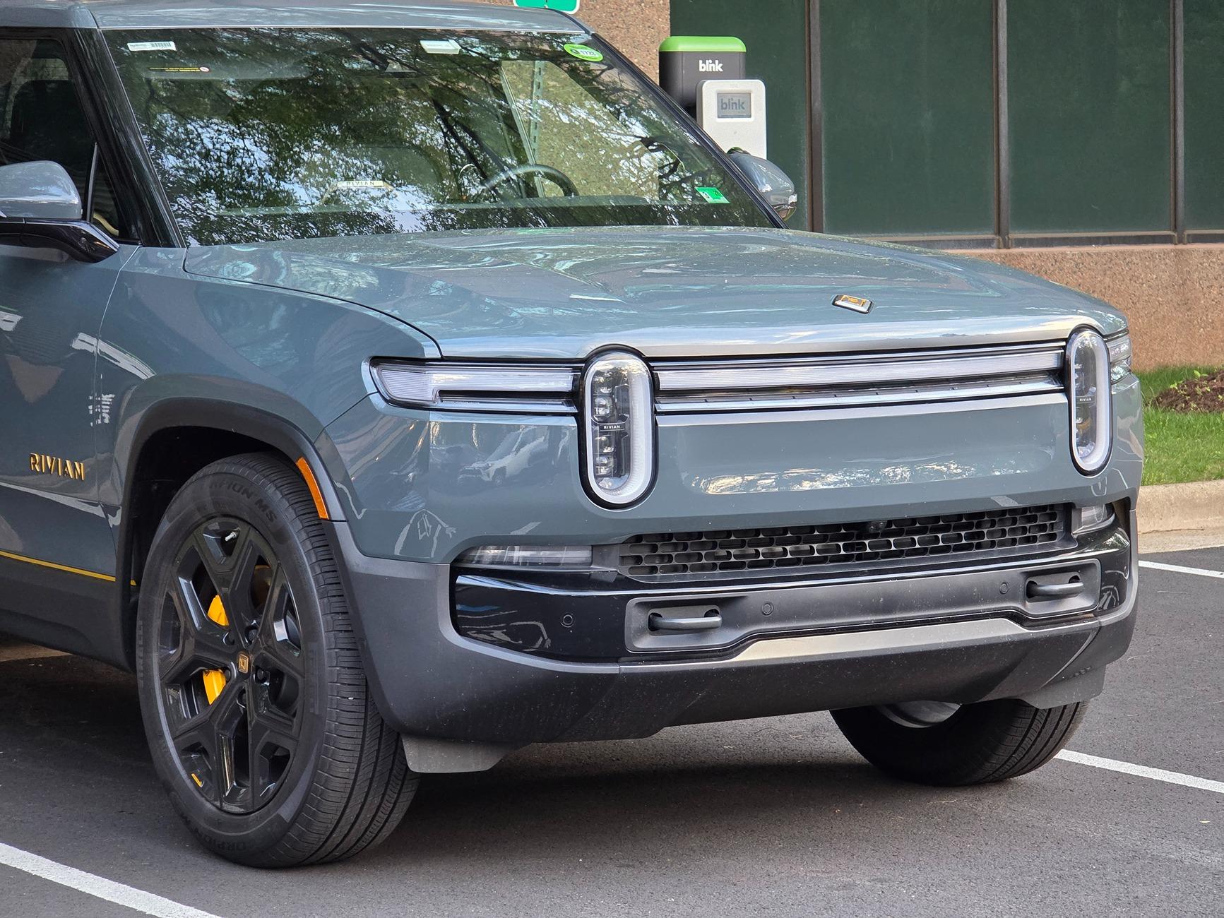 Rivian R1T R1S Front appearance improvement with vinyl on front light bar + side stripes! 54502451918_30ffae19c6_o