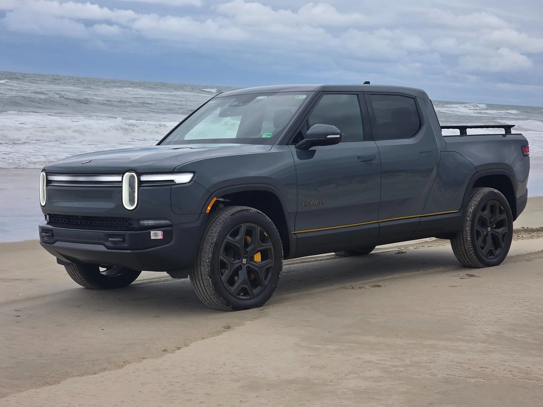 Rivian R1T R1S Front appearance improvement with vinyl on front light bar + side stripes! 54447803898_98a984c7e6_o