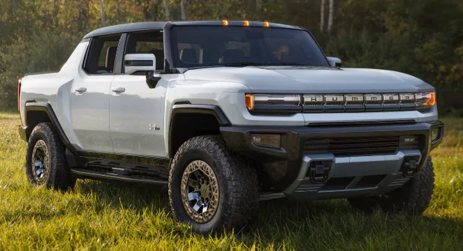 Rivian R1T R1S Front appearance improvement with vinyl on front light bar + side stripes! 1746657400236-d