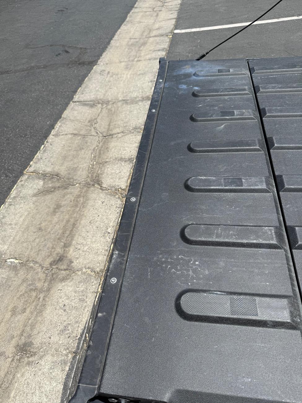 Rivian R1T R1S The R1T tailgate trim is not robust enough IMO IMG_0494