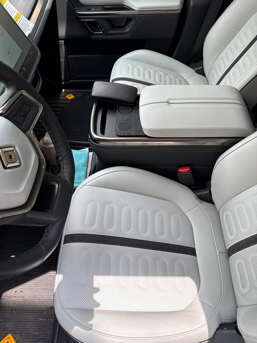Rivian R1T R1S Seat calibration failed. Drivers stuck forward cannot move back fully. IMG_3463