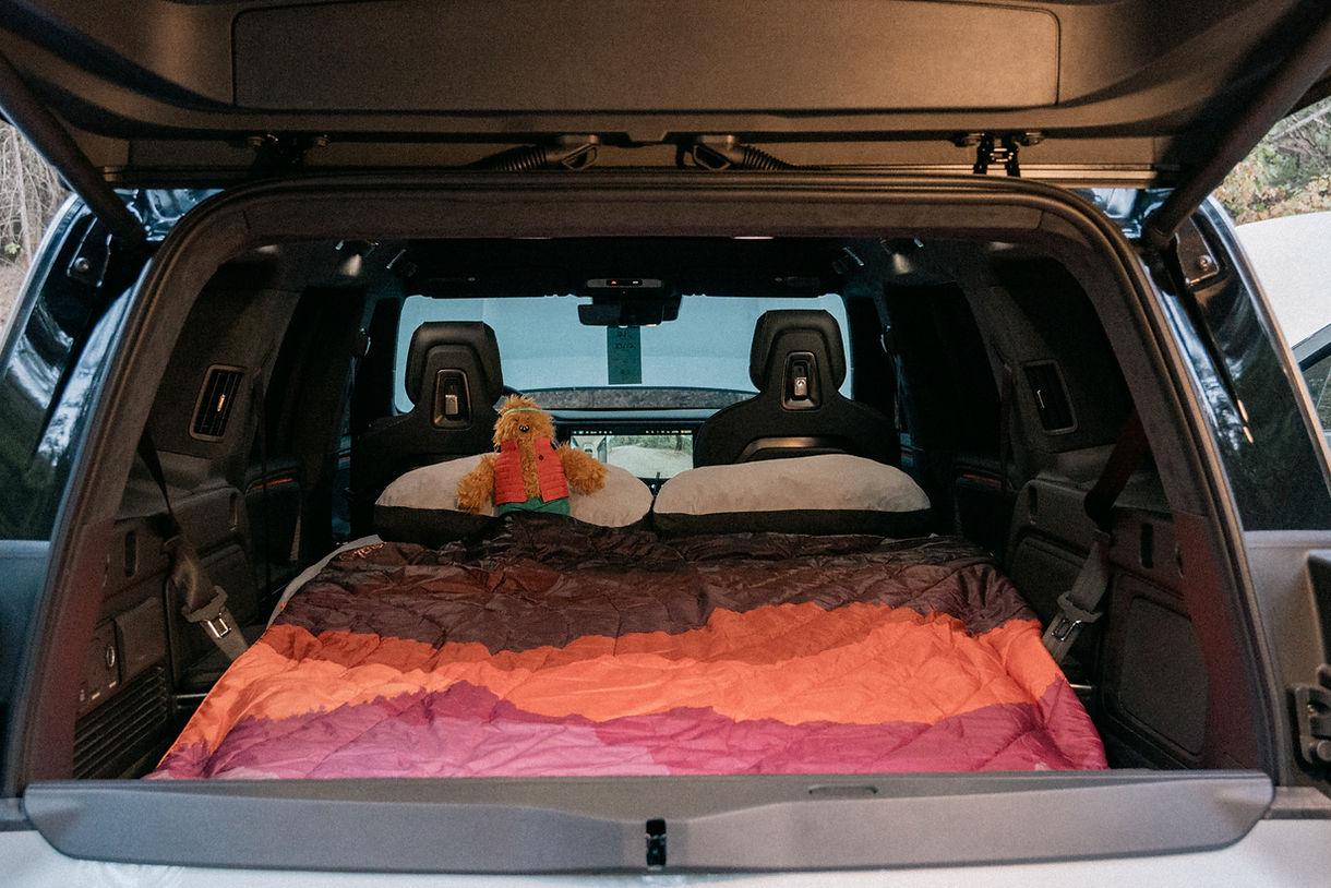 Rivian R1T R1S The Ultimate Rivian R1S Car Camping Guide: Mattress, iPad Mount, Projector, Storage, Racks, and More 785ef3_9e89efdb207c48cf9ed4e29eb8750318~mv2