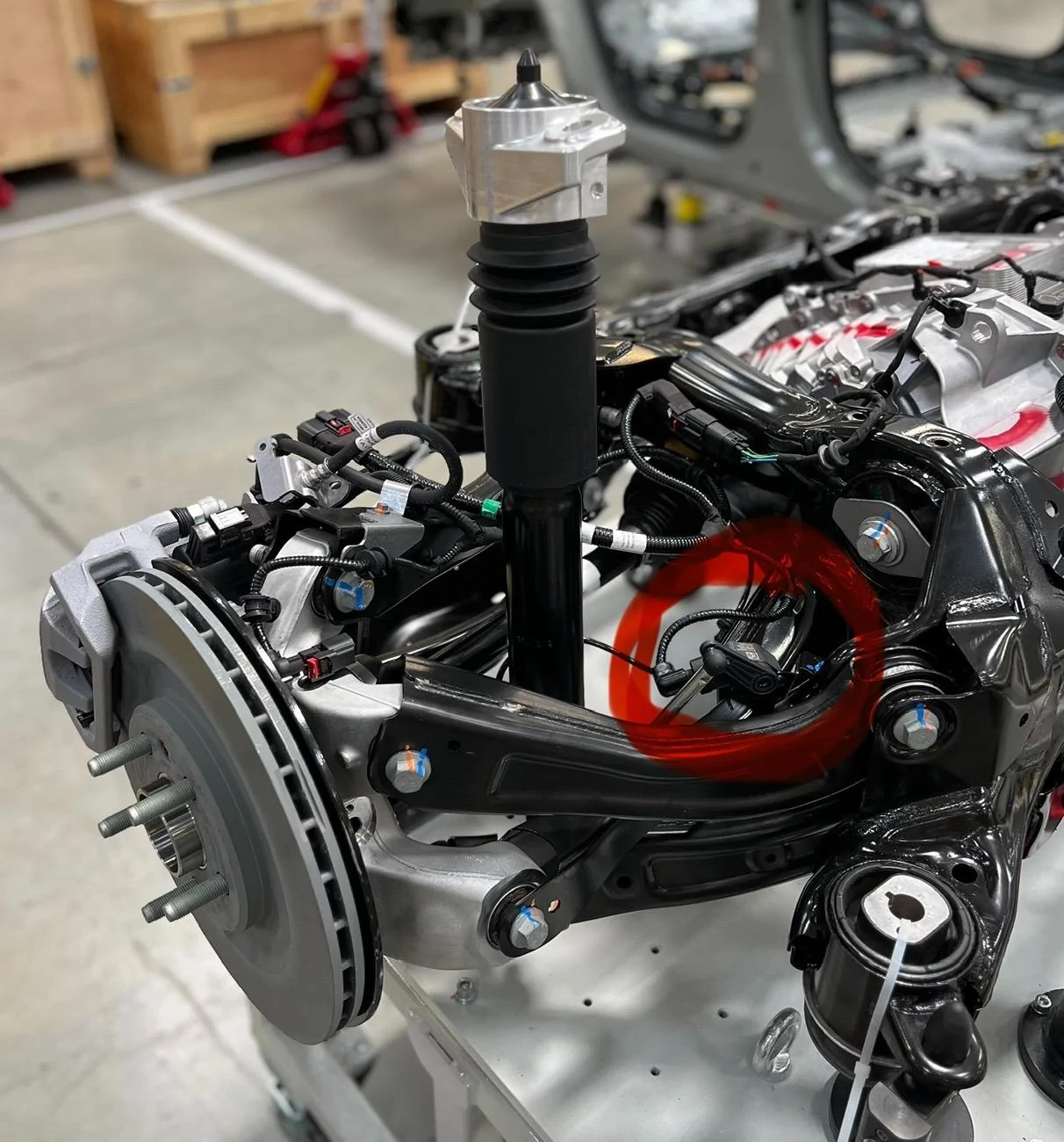 Rivian R1T R1S R2 rear suspension has "incredible ride quality and handling" says RJ Scaring with preview photos IMG_4109