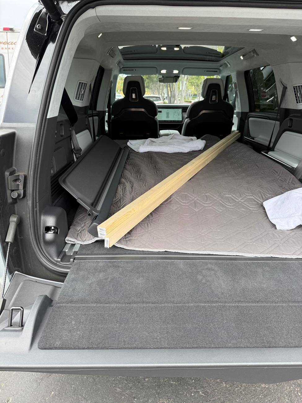 Rivian R1T R1S 8ft lumber fits in R1S IMG_1678