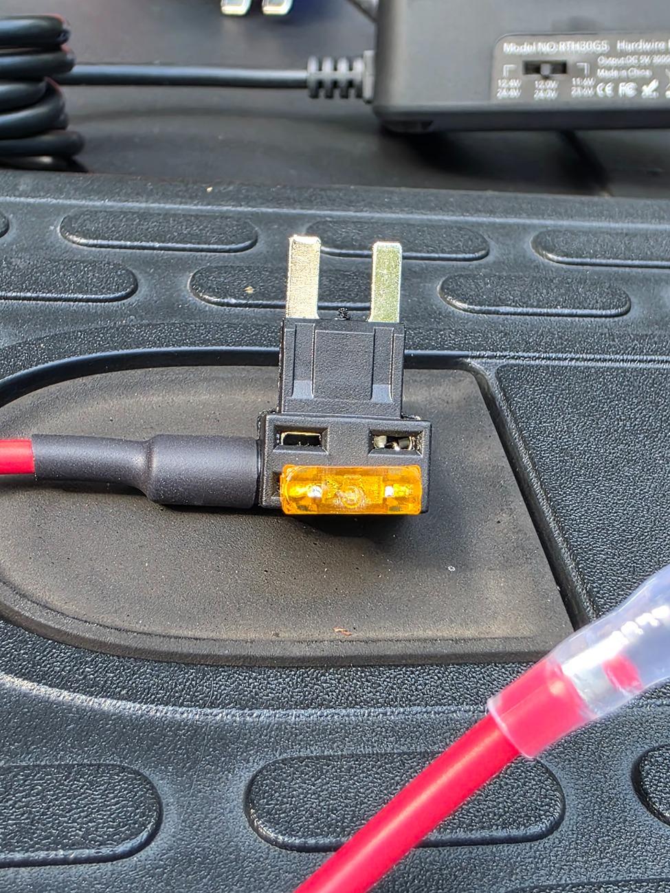 Rivian R1T R1S Interior passenger-side fuse box 20250619_174558