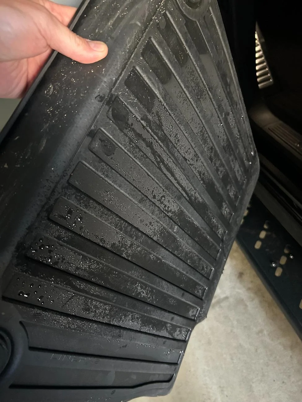 Rivian R1T R1S PSA: Make Sure to Check Your Driver Side Mats and Passenger Side Mats for Moisture after HVAC drain Plug Campaign RCA-26-24-002-1 IMG_4498