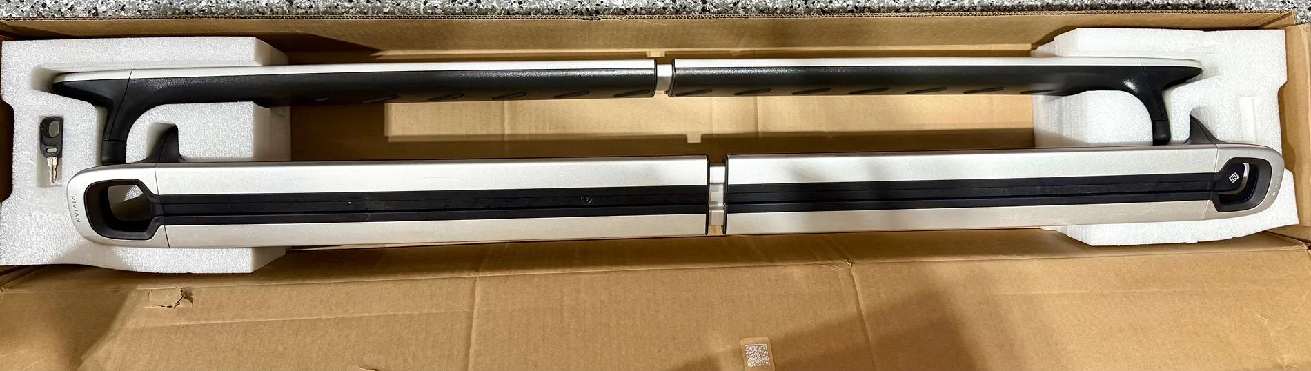 Rivian R1T R1S Silver OEM crossbars in box two keys IMG_5757