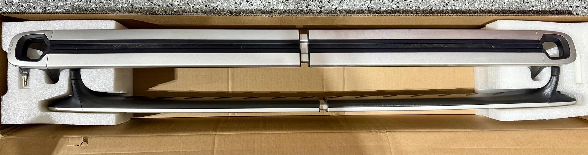 Rivian R1T R1S Silver OEM crossbars in box two keys IMG_5756