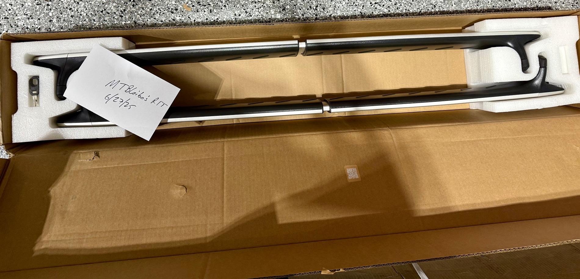 Rivian R1T R1S Silver OEM crossbars in box two keys IMG_5752