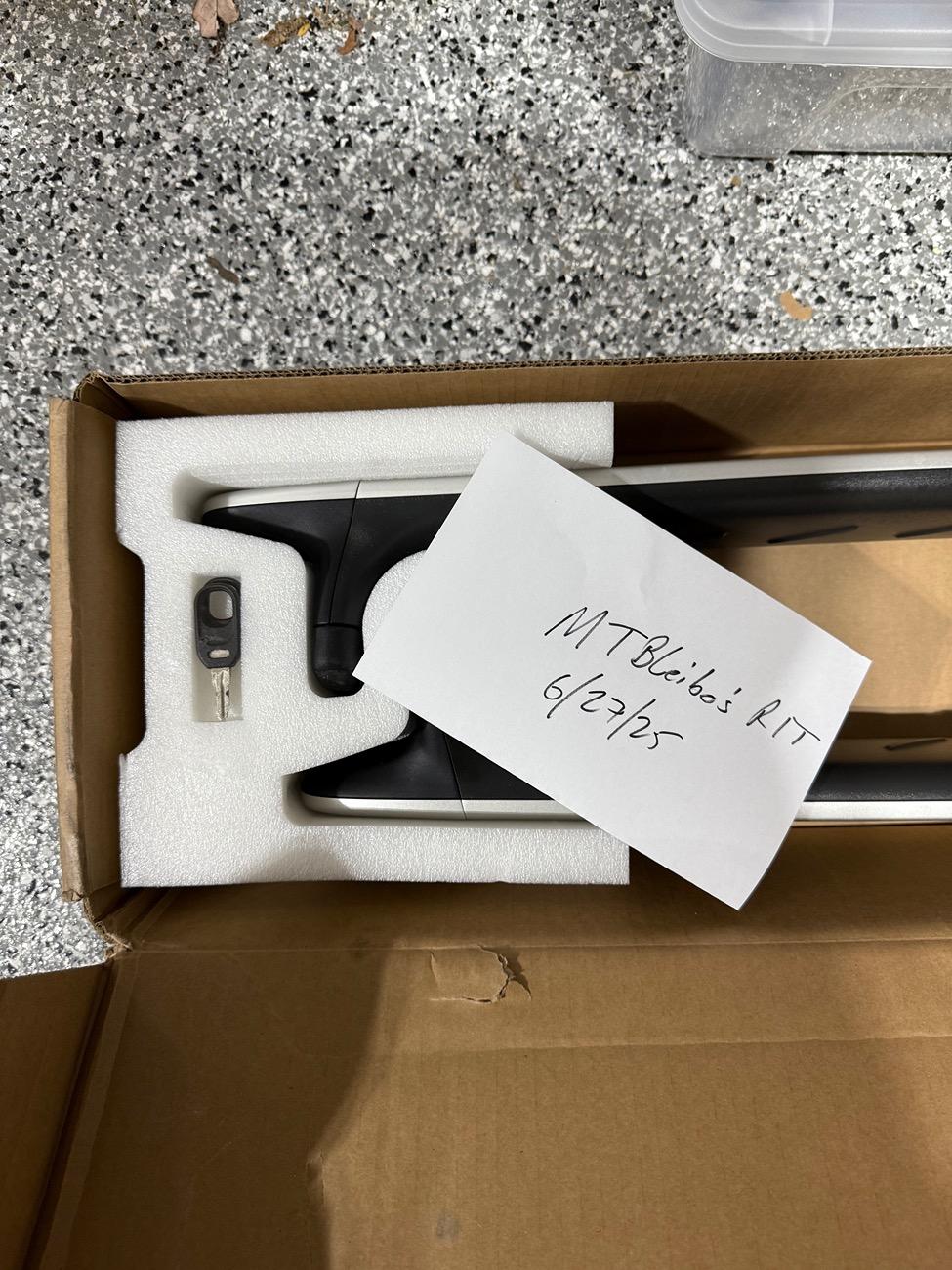 Rivian R1T R1S Silver OEM crossbars in box two keys IMG_5753