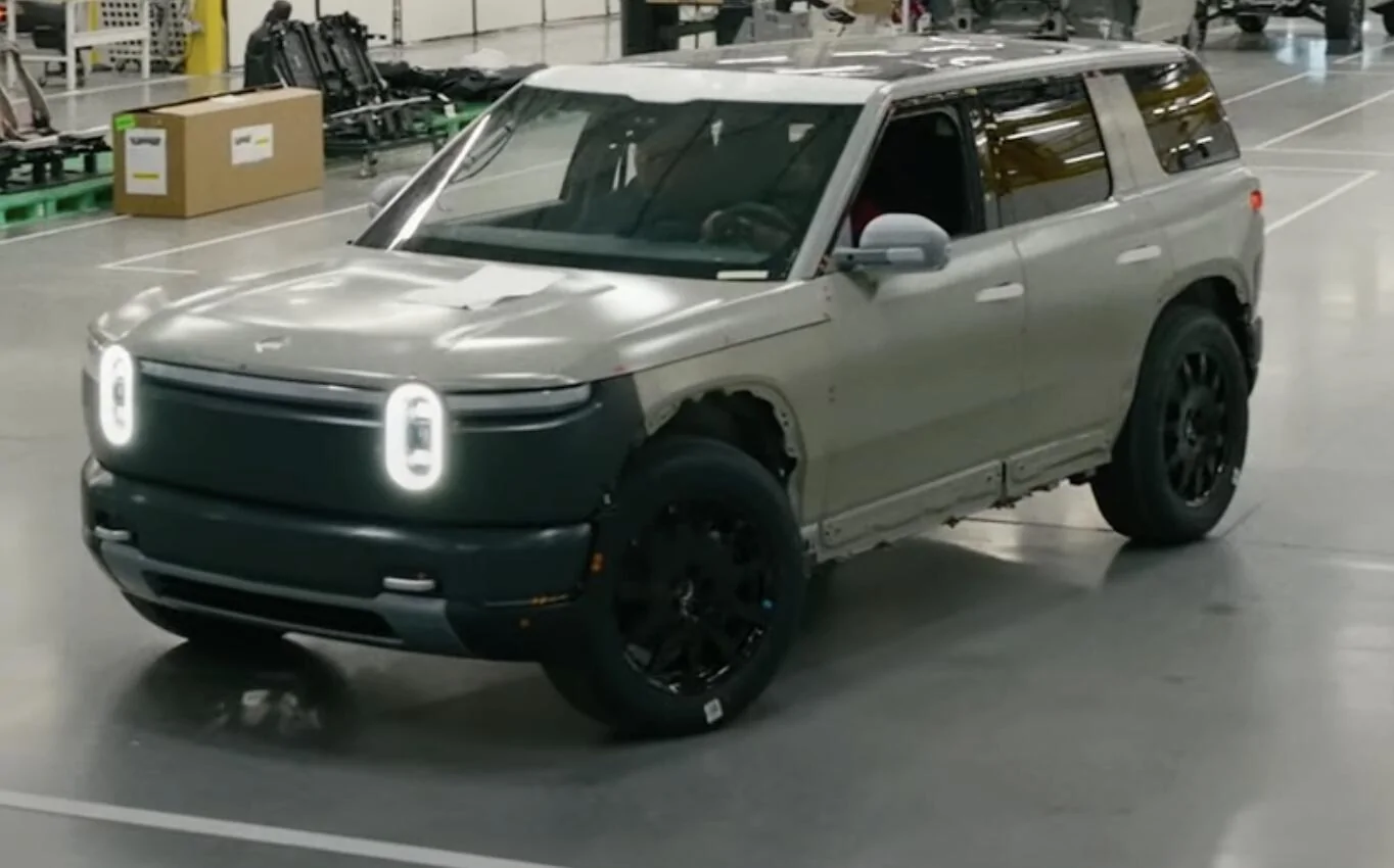 Rivian R1T R1S RJ posts video of R2 design validation build on 4-post shaker rig Screenshot 2025-06-27 at 1.37.49 PM