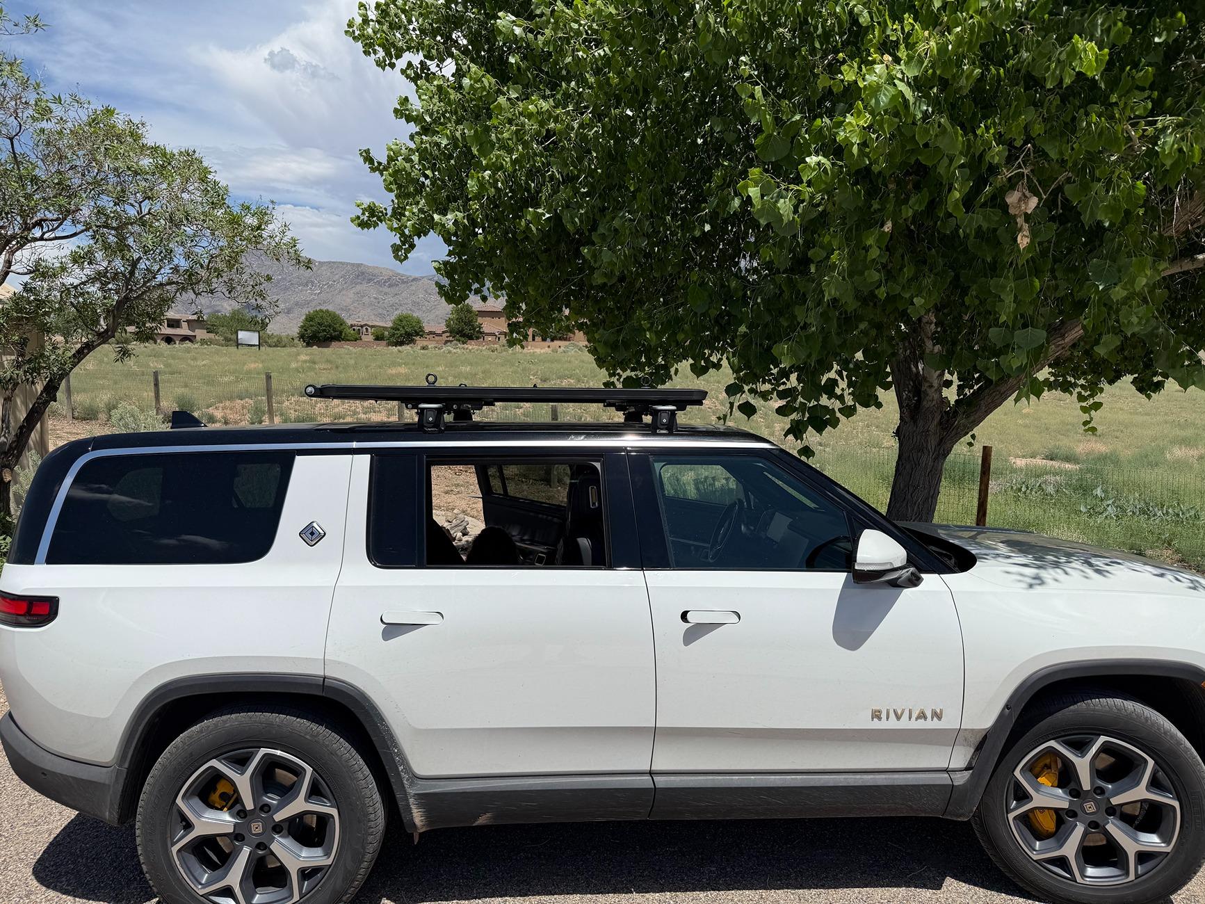 Old square bar roof rack: Adapt to mount to Rivian crossbar via clamp ...
