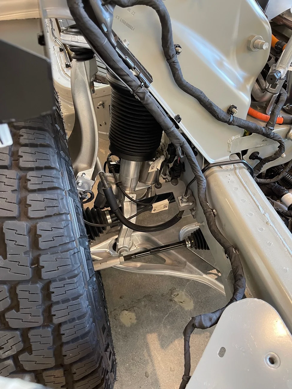 Rivian R1T R1S Clunking sound from front end. IMG_9611