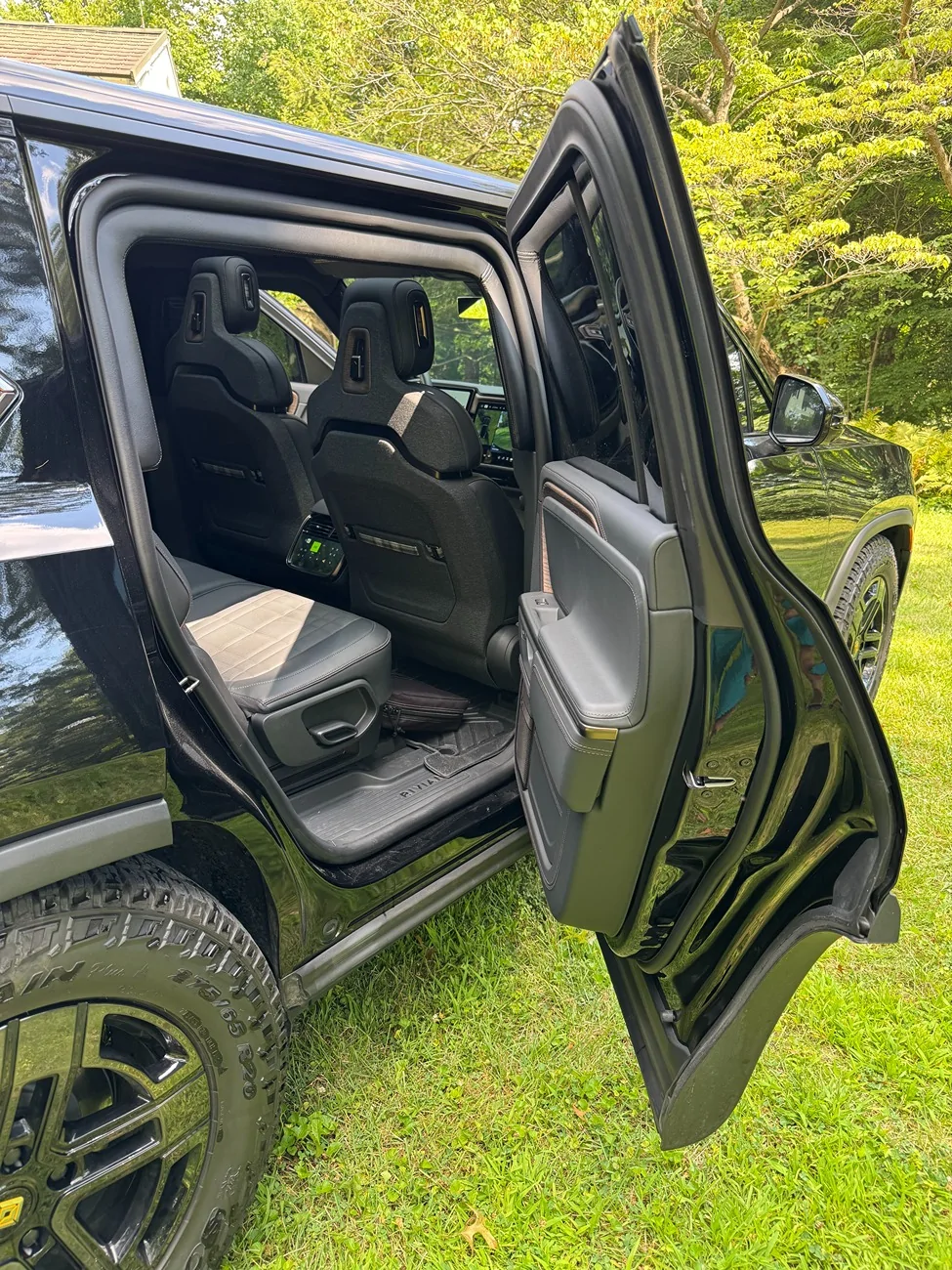 Rivian R1T R1S Did someone say Armor? Real Ballistic Armored (Bulletproof) R1S Tri Motor in production process... R1S_Passenger_Rear_Door_Open