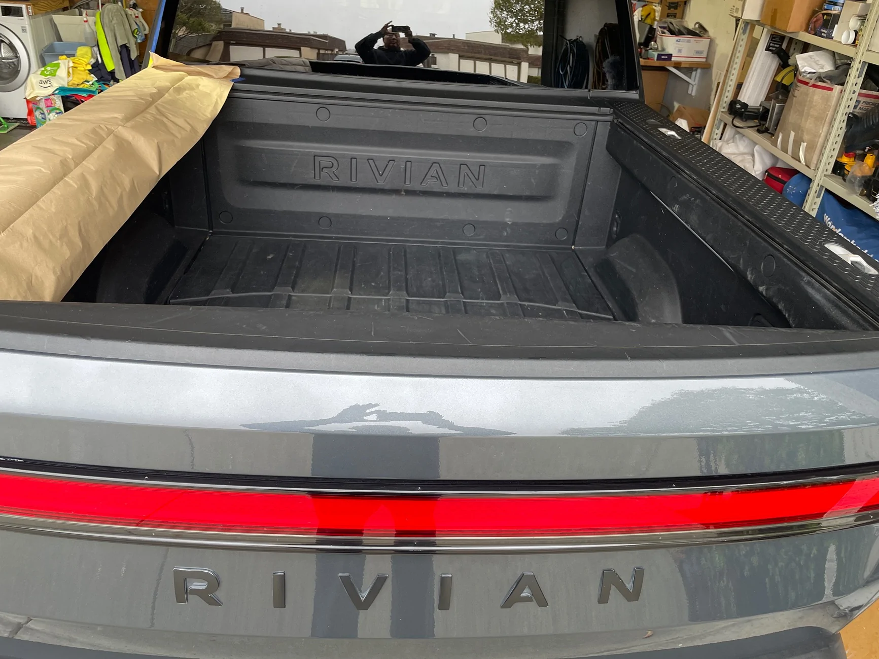 Rivian R1T R1S Applied XPEL protection film to R1T tailgate top trim R1T Befor