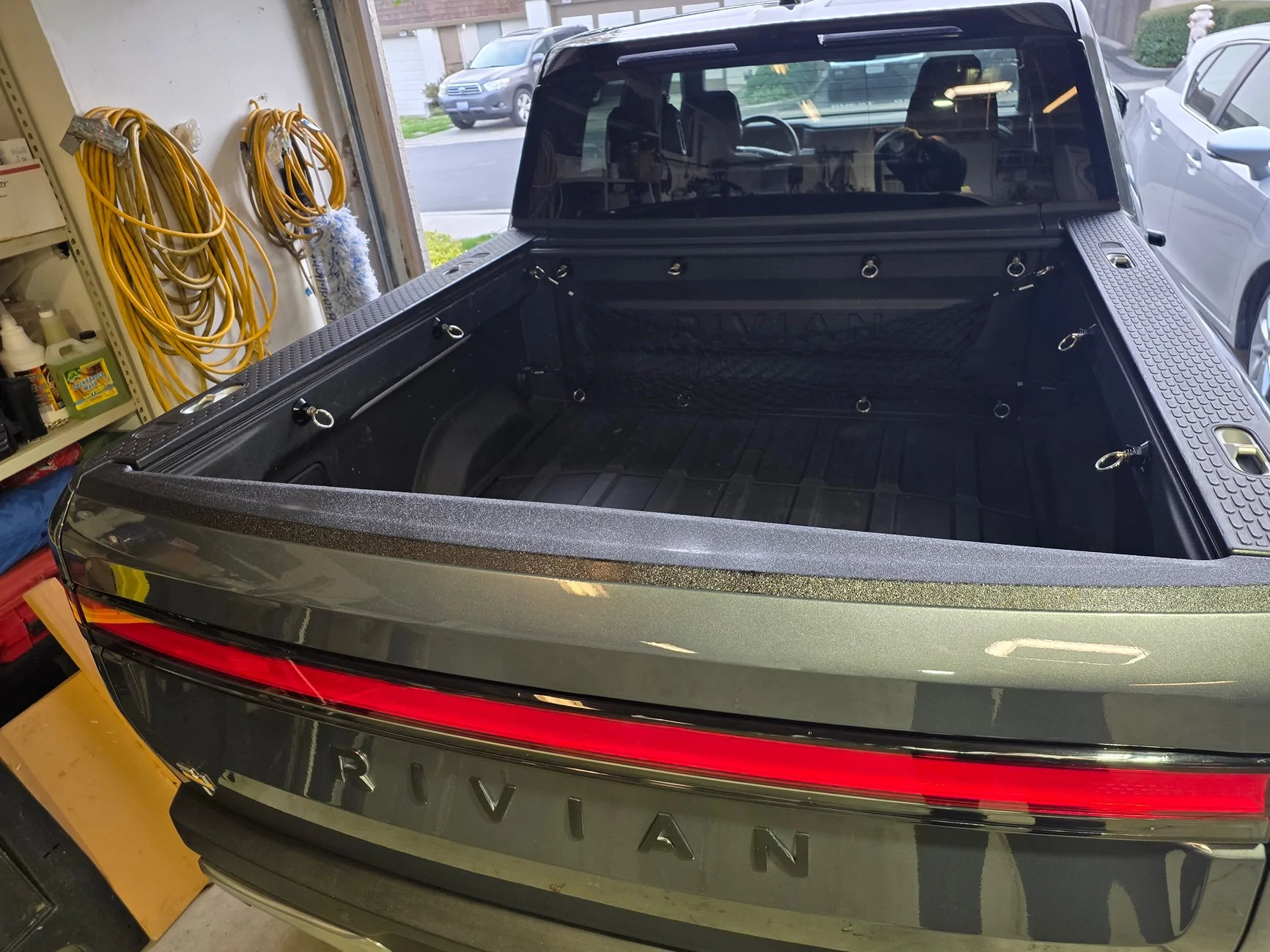 Rivian R1T R1S Applied XPEL protection film to R1T tailgate top trim After2