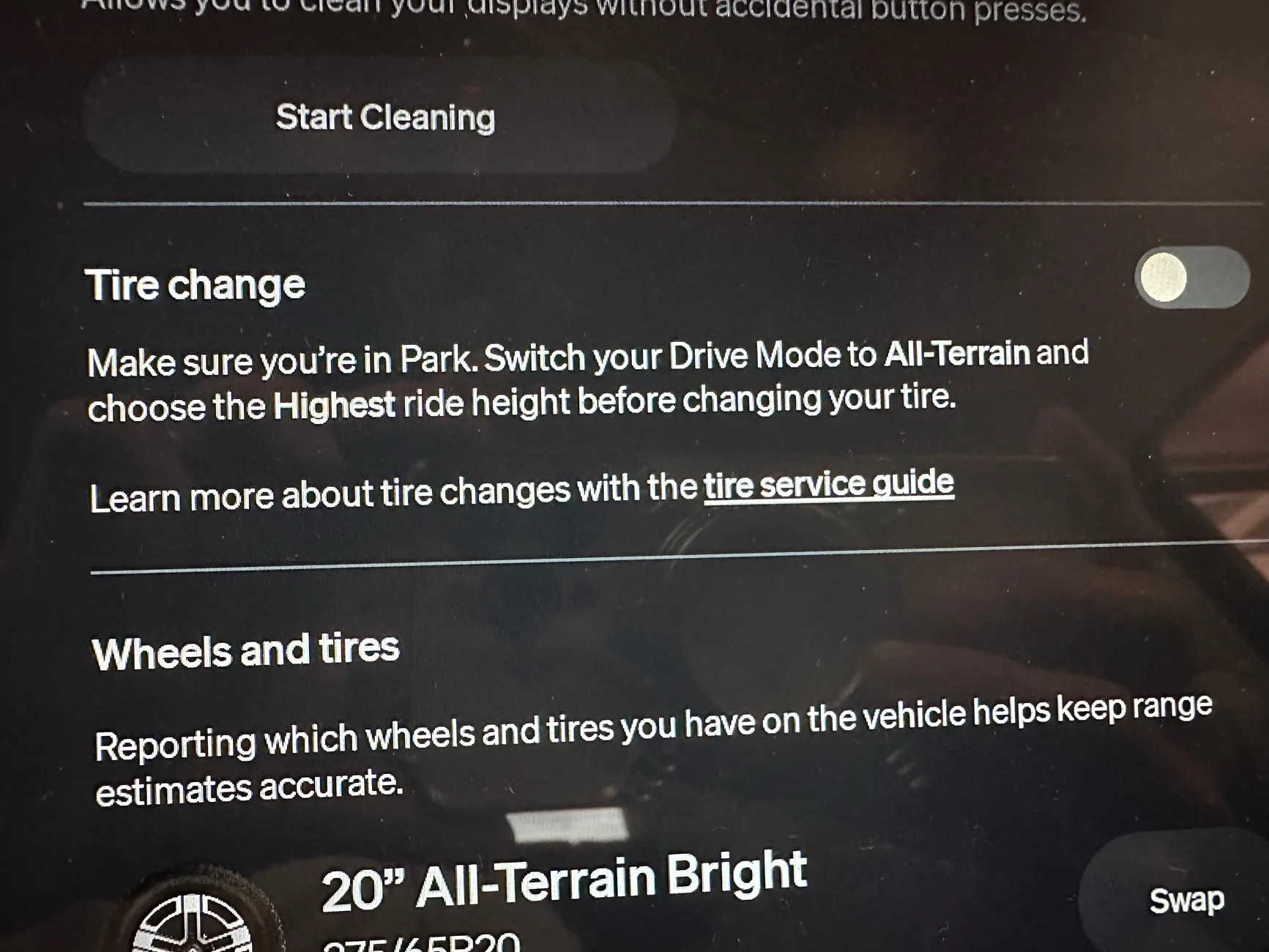 Rivian R1T R1S Tire change ride height suggestion differs between guide and service setting IMG_5755