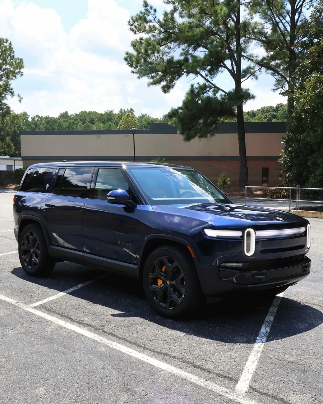 From Stock Color to Stunning: My R1S in Dark Blue Wrap | Rivian Forum ...