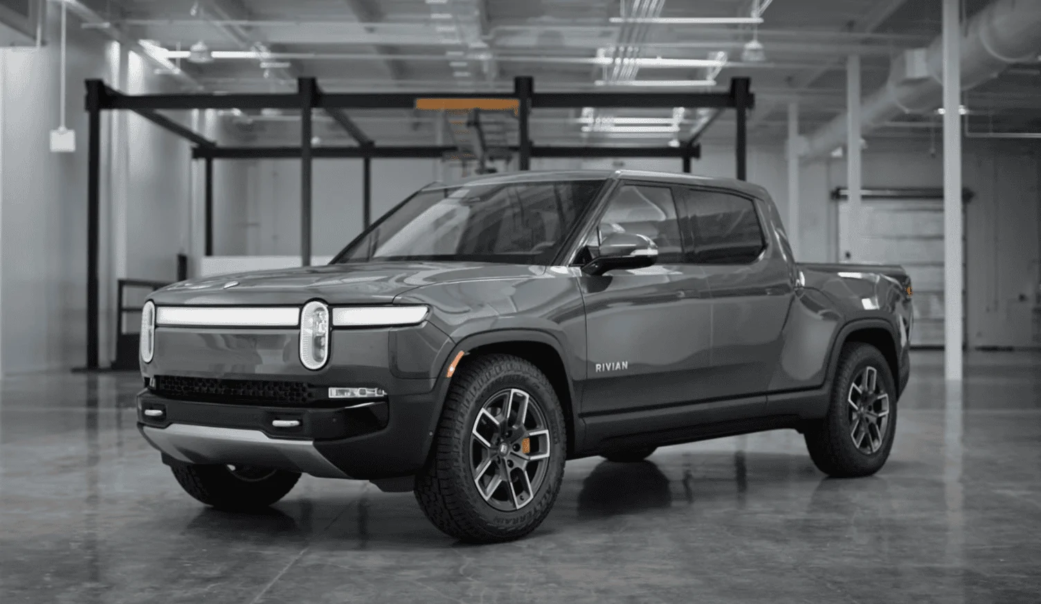 Rivian R1T R1S Introducing Rivian Gear Guard -- camera and cable system that protects everything in your R1T. Screen Shot 2022-02-14 at 3.15.30 PM
