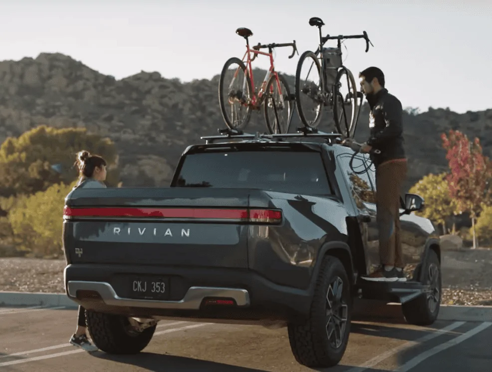 Rivian R1T R1S Introducing Rivian Gear Guard -- camera and cable system that protects everything in your R1T. Screen Shot 2022-02-14 at 3.17.16 PM