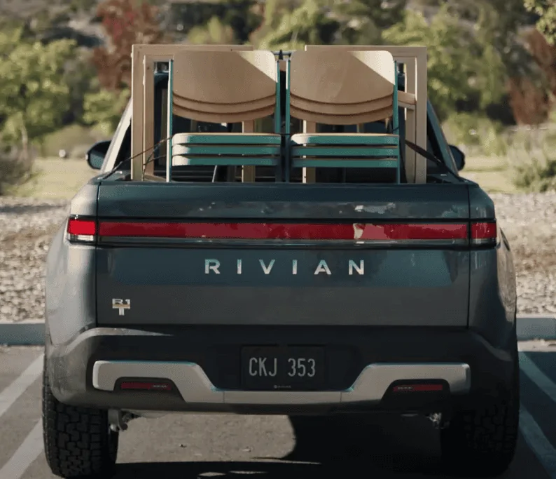Rivian R1T R1S Introducing Rivian Gear Guard -- camera and cable system that protects everything in your R1T. Screen Shot 2022-02-14 at 3.17.58 PM