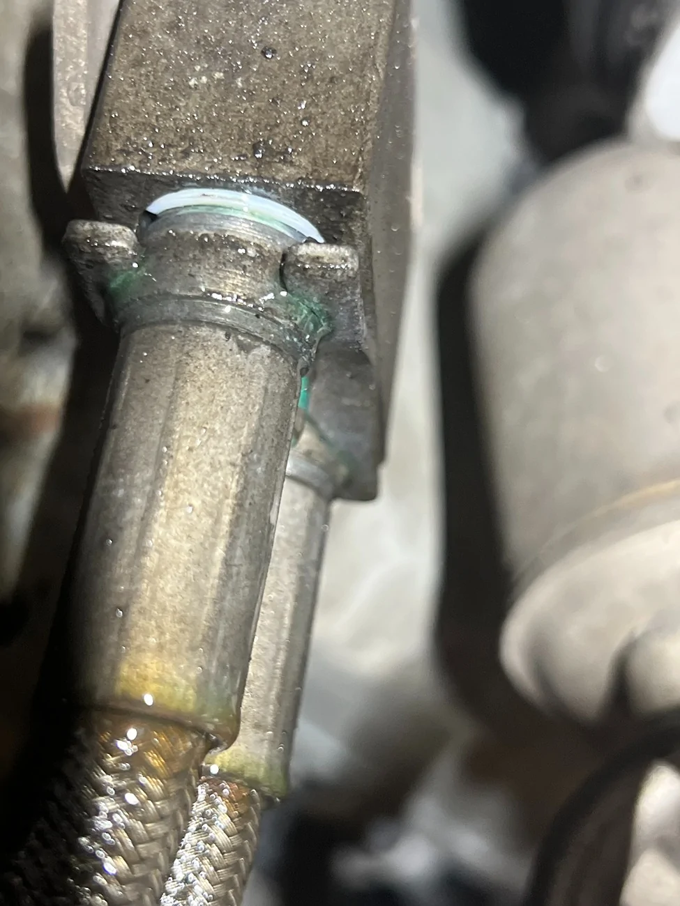 Rivian R1T R1S Fluid leaking from the shock absorber. IMG_9084