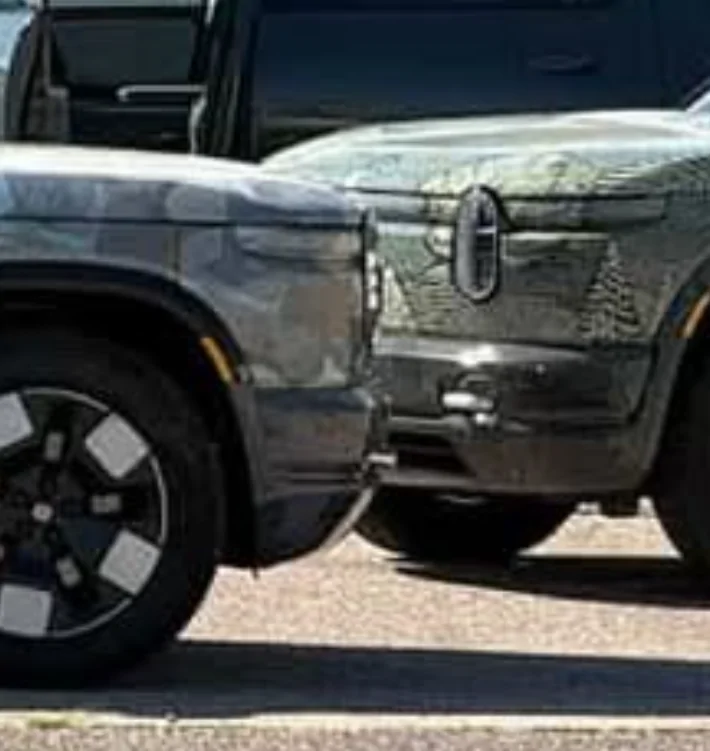 Rivian R1T R1S R2 spotted charging via NACS port at Tesla Supercharger 1000006114
