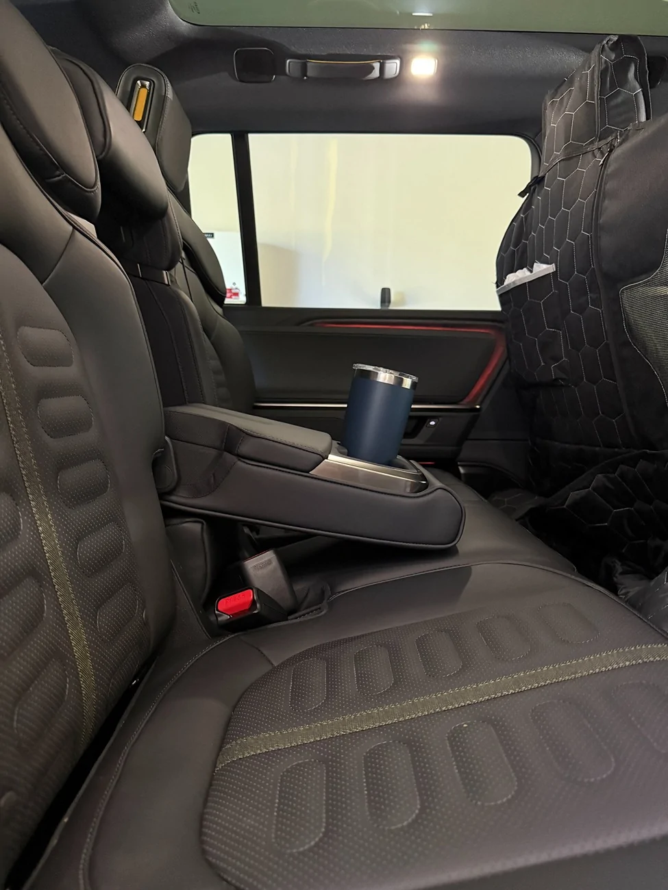 Rivian R1T R1S Middle Row Armrest/Cup Holder Not Level? IMG_6491