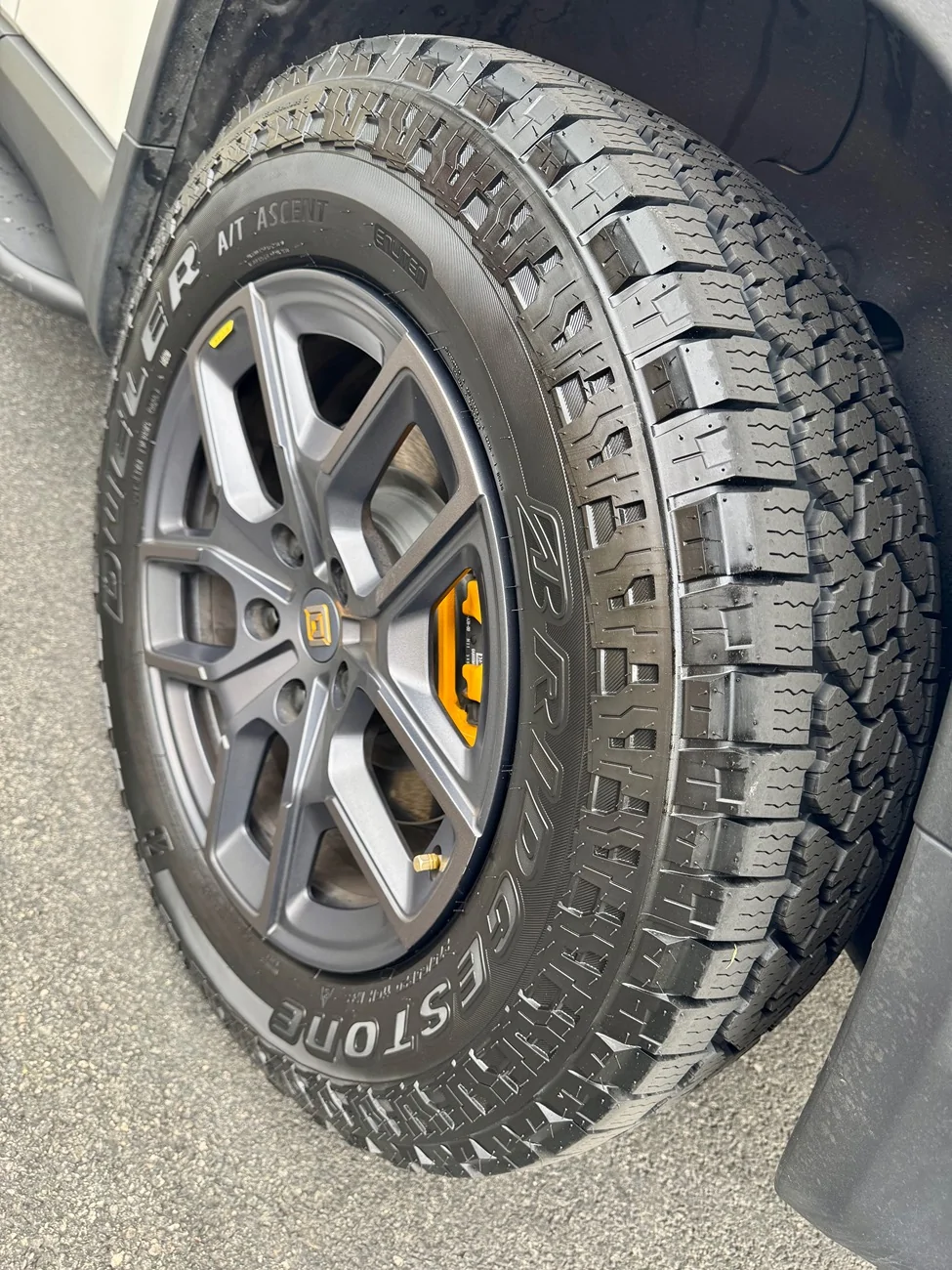 Rivian R1T R1S Any experience with Bridgestone Dueler A/T Ascent SL 275/65 20? IMG_3760