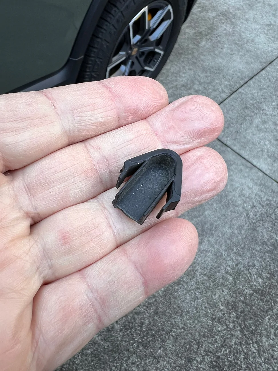Rivian R1T R1S Washed R1T and found a plastic part on driveway! IMG_9873