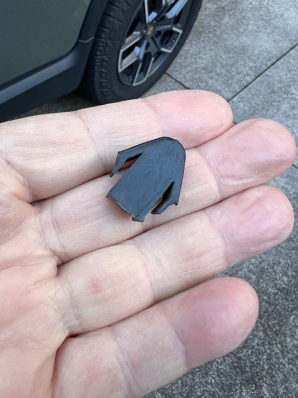 Rivian R1T R1S Washed R1T and found a plastic part on driveway! IMG_9872