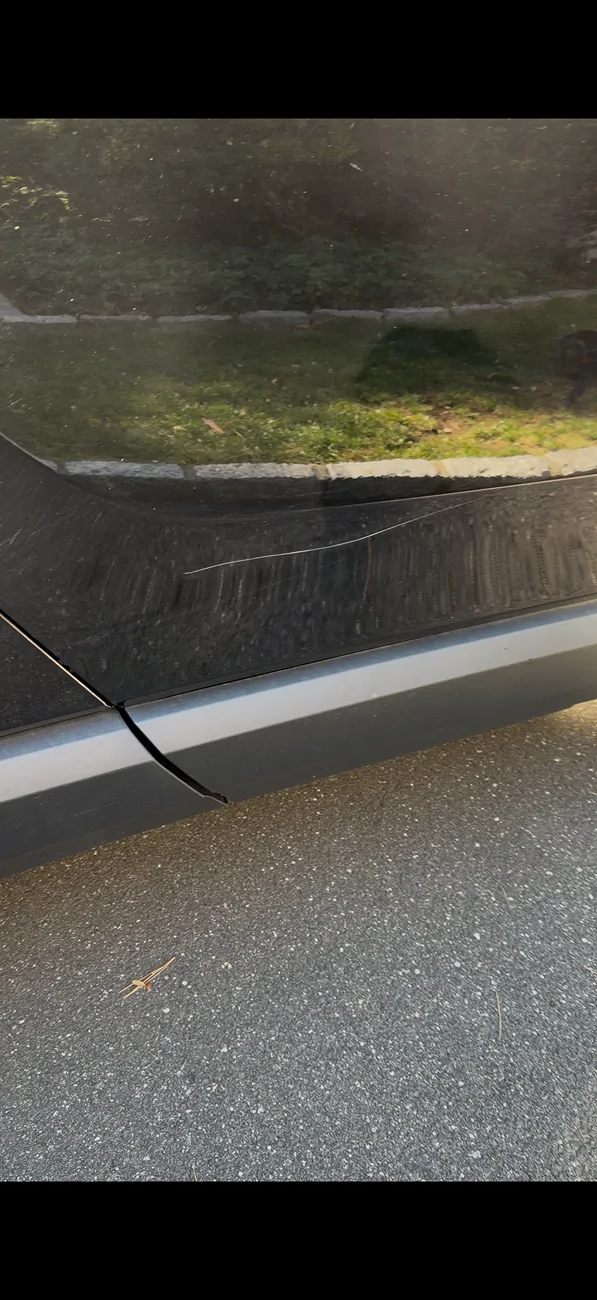 Rivian R1T R1S Scratch on rear passenger door - how much to repair / repaint? IMG_0199