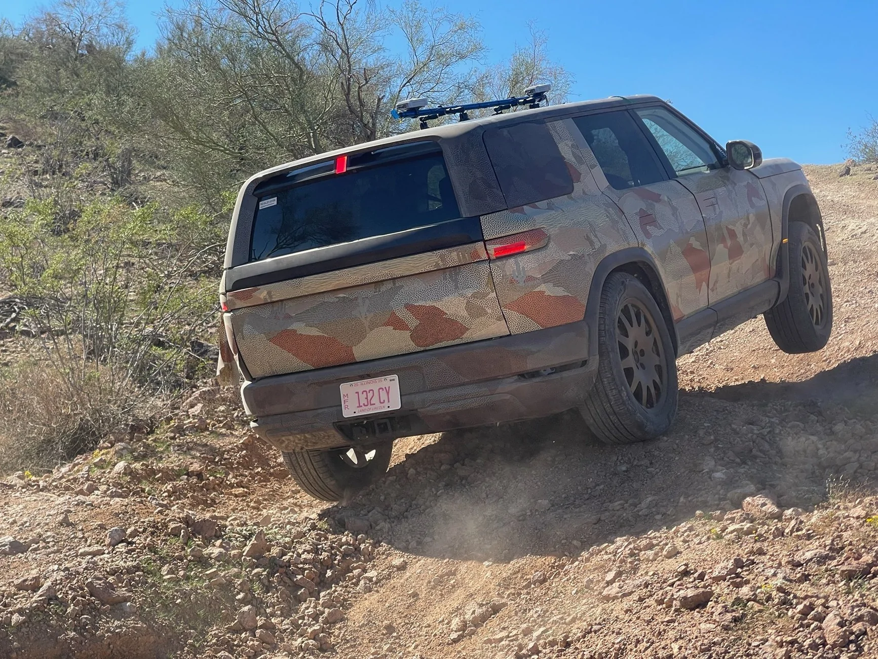 Rivian R1T R1S R2 prototypes off-road testing G4X_UEcasAET7AC
