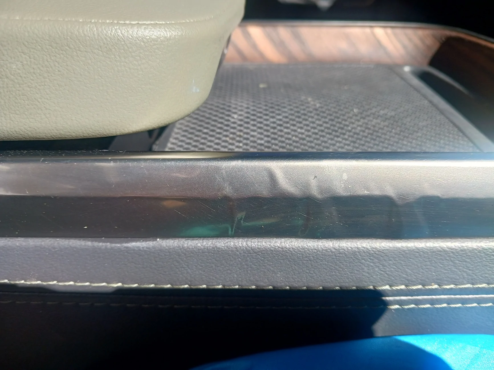 Rivian R1T R1S 2023 R1S - center console silver trim piece "peeling"? 20251020_111350