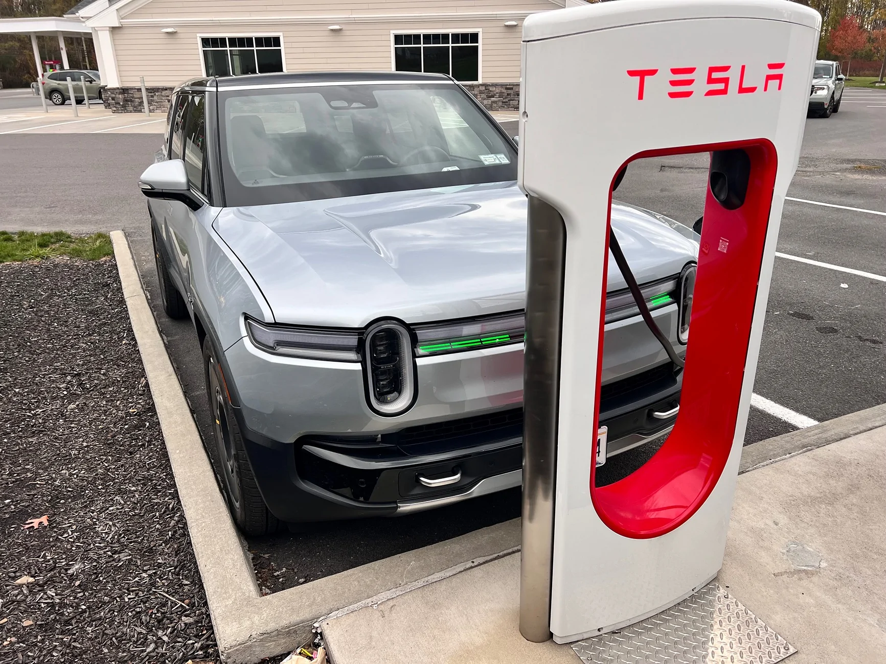 Rivian R1T R1S Tesla supercharger question: blocking a stall due to short cable IMG_8251