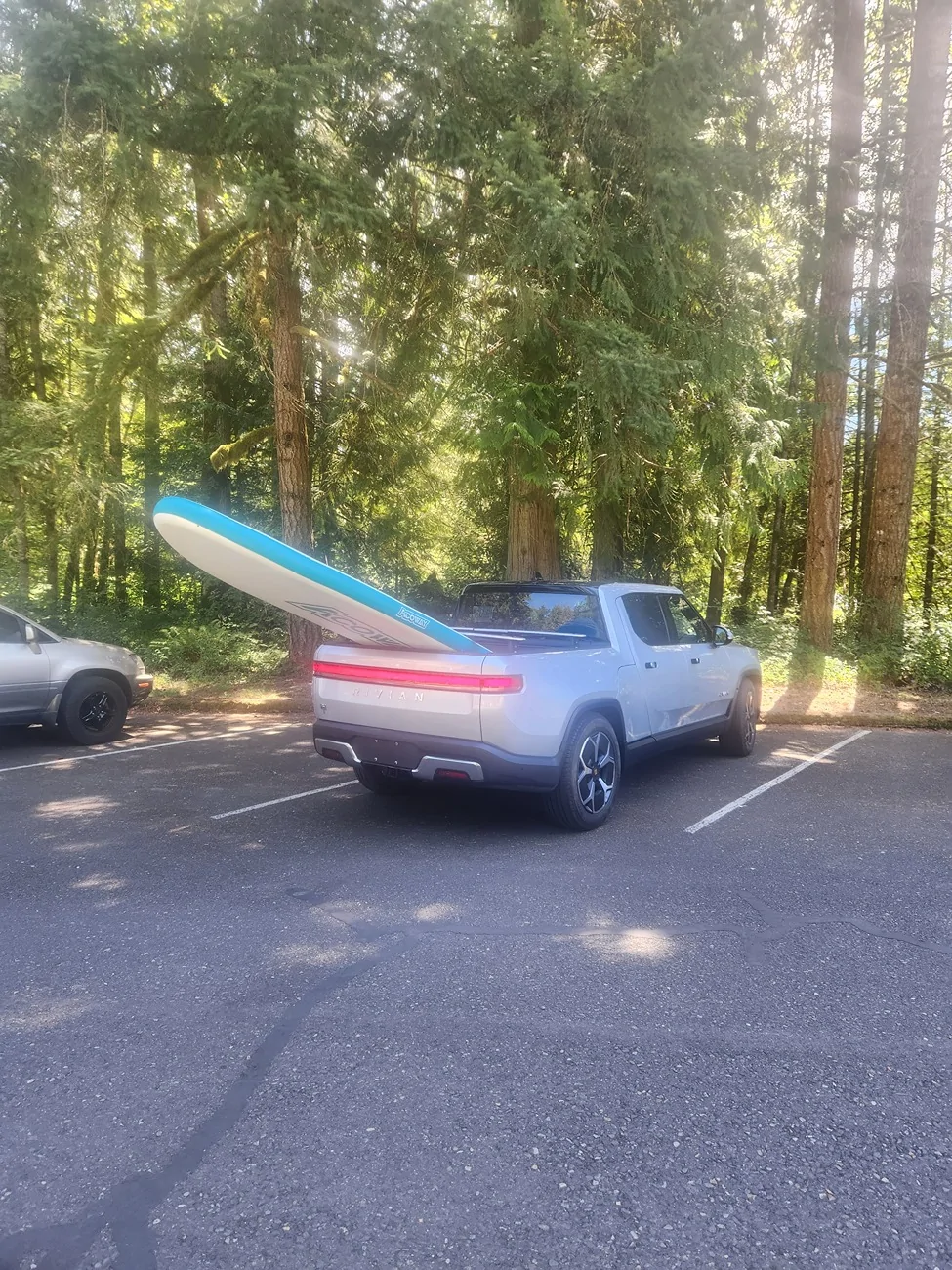 Rivian R1T R1S Does anyone use crossbars + surf/sup mount for a large SUP? SUP 1