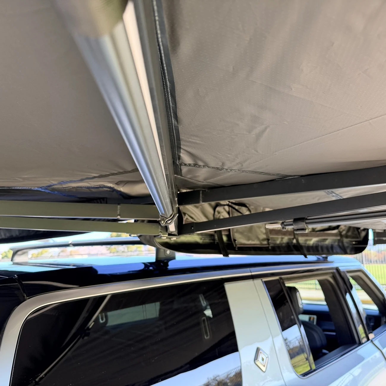 Rivian R1T R1S R1S OEM Crossbar and RTT + Awning - questions IMG_4234