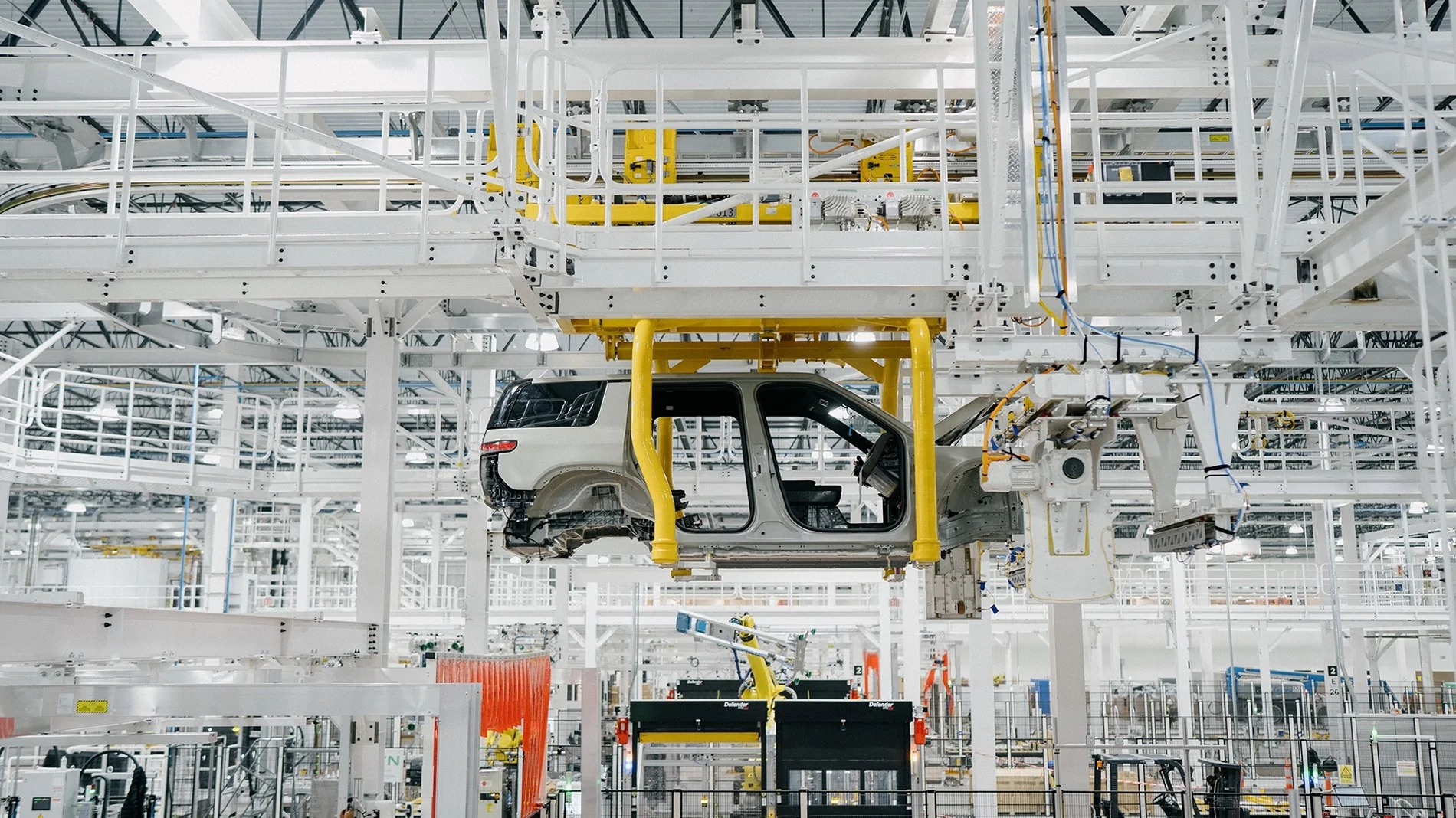Rivian R1T R1S Rivian "can’t wait to bring R2 to you this year!" (Pre Production Assembly Photos & Happy 2026 New Year Message) rivian r2 production assembly photos 4