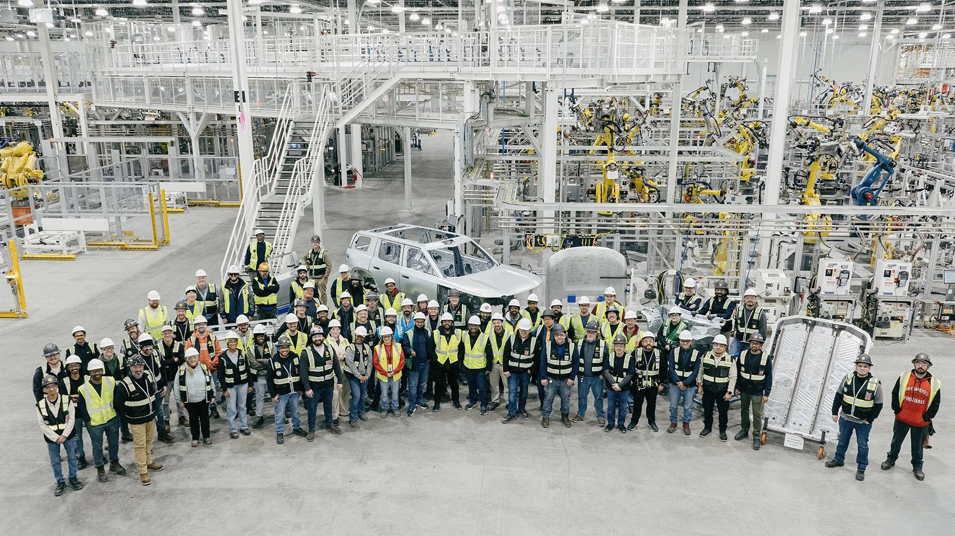 Rivian R1T R1S Rivian "can’t wait to bring R2 to you this year!" (Pre Production Assembly Photos & Happy 2026 New Year Message) rivian r2 production assembly photos 1