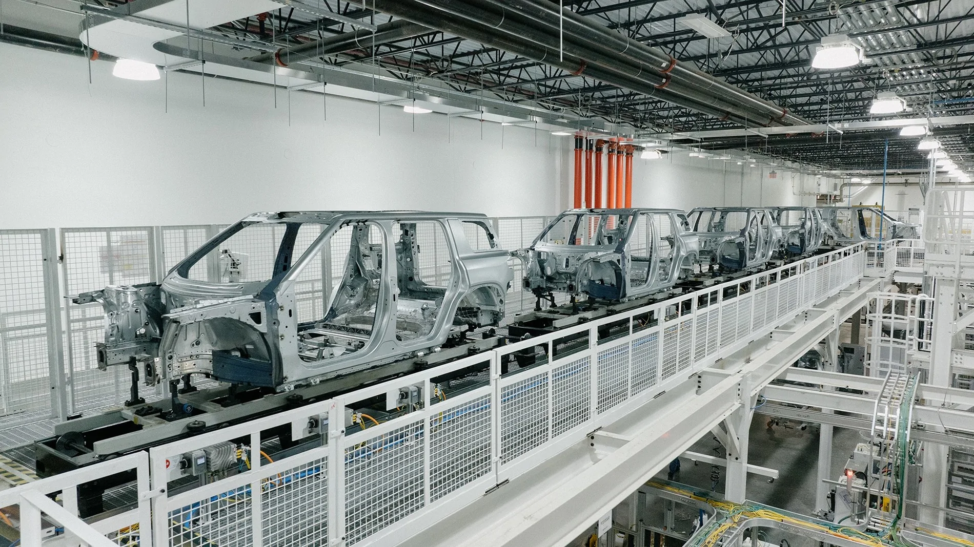 Rivian R1T R1S Rivian "can’t wait to bring R2 to you this year!" (Pre Production Assembly Photos & Happy 2026 New Year Message) rivian r2 production assembly photos 3