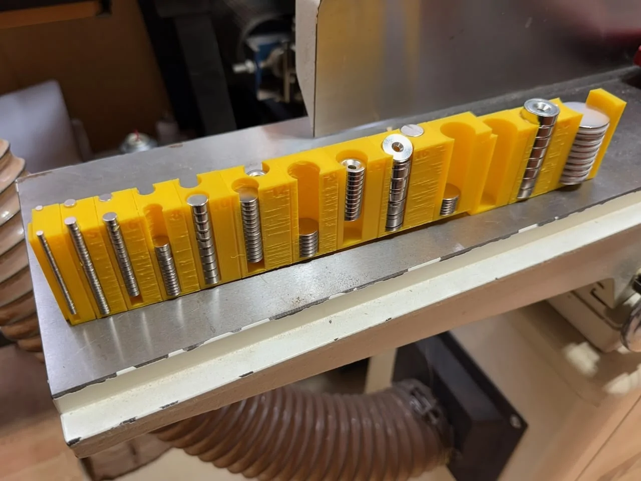 Rivian R1T R1S Gear tunnel mod to make the doors pop open (w/ magnets) IMG_0617