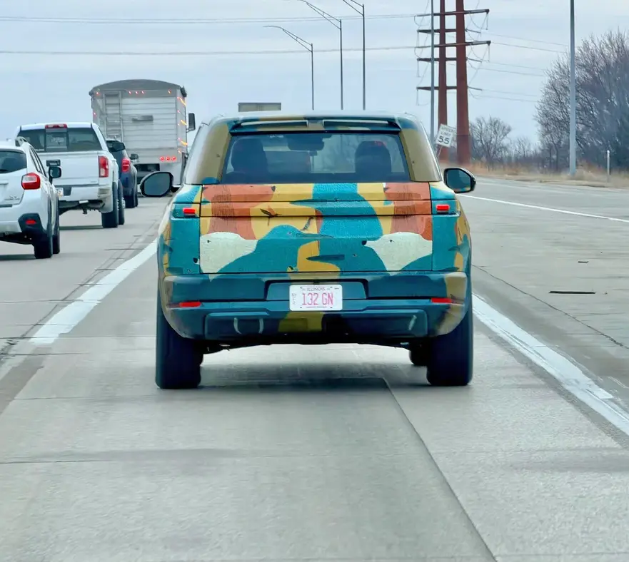Rivian R1T R1S New wheels & camo spotted on R2 prototype New wheels & camo spotted on R2 prototype  2