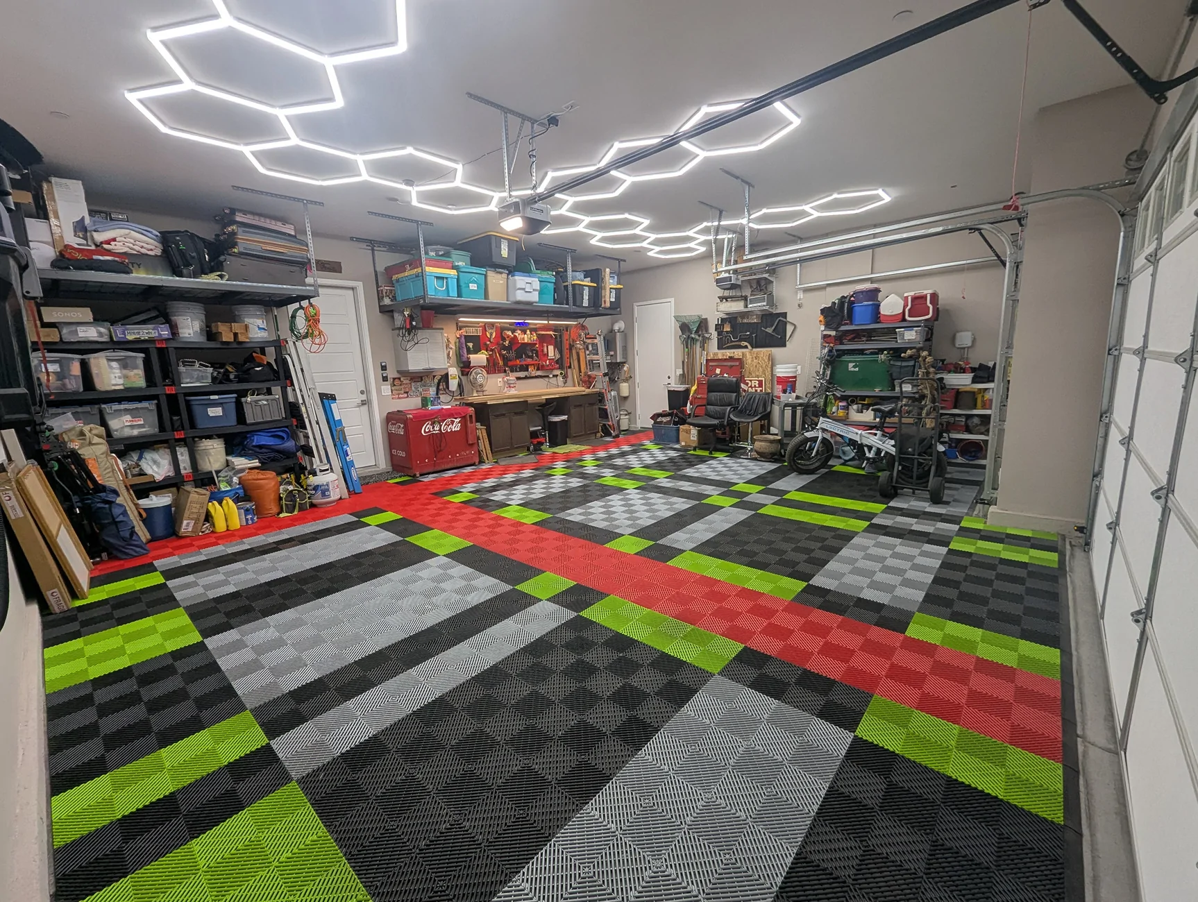 Rivian R1T R1S Anyone using garage tiles under their heavy Rivian? PXL_20250216_012423583
